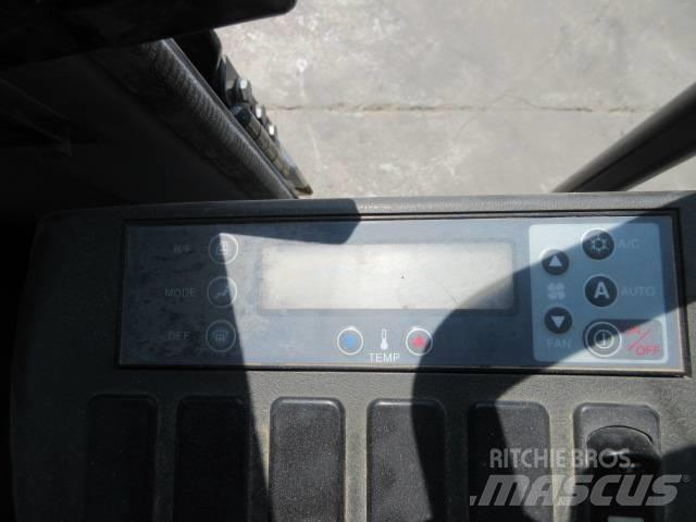 New Holland E 245 Bageri guseničari