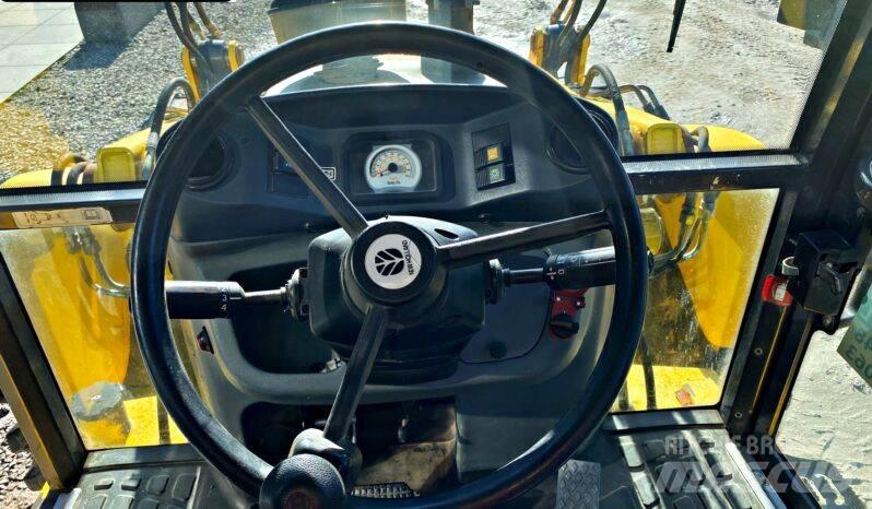 New Holland B 115 Rovokopači