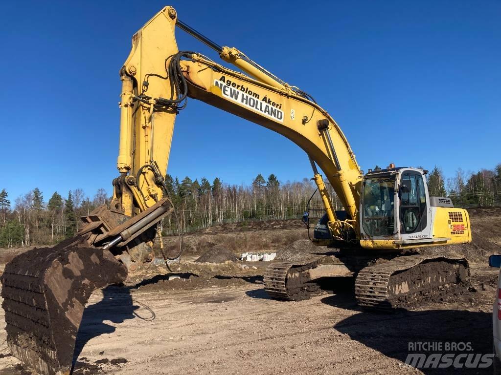 New Holland E 385 Bageri guseničari