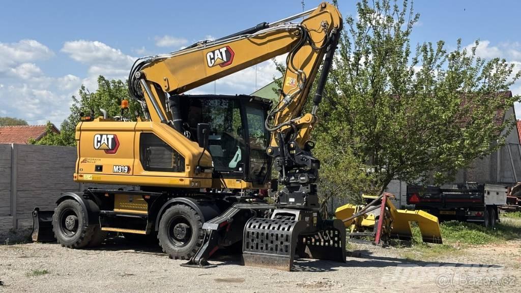 CAT M 319 Bageri točkaši