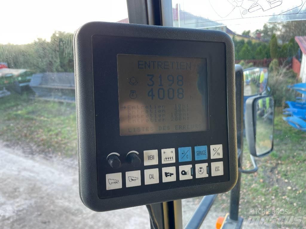 New Holland TX 66 Kombajni