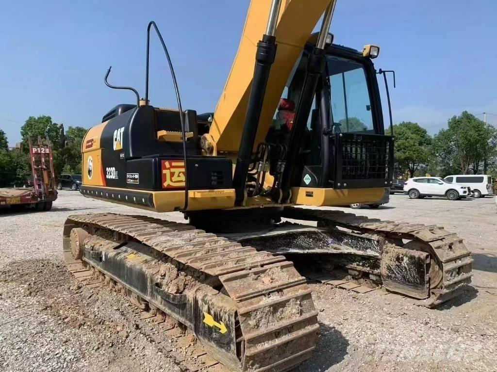 CAT 323D Bageri guseničari