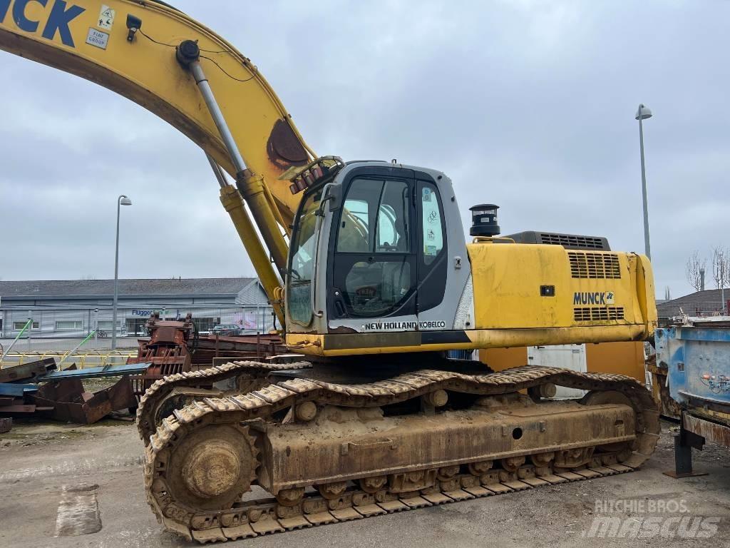 New Holland E 485 Bageri guseničari