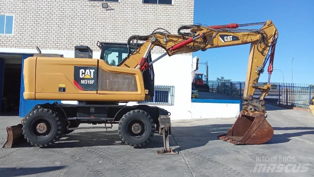 CAT M318F Bageri točkaši