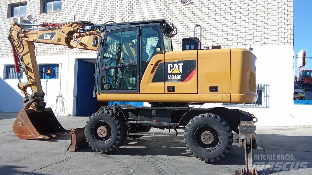 CAT M318F Bageri točkaši