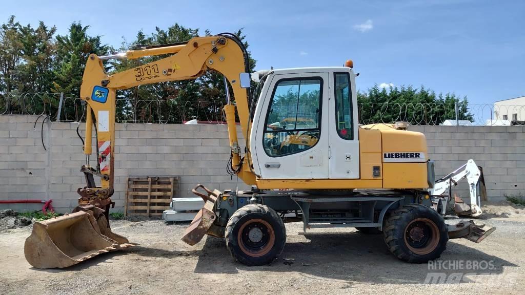 Liebherr A 311 Bageri točkaši