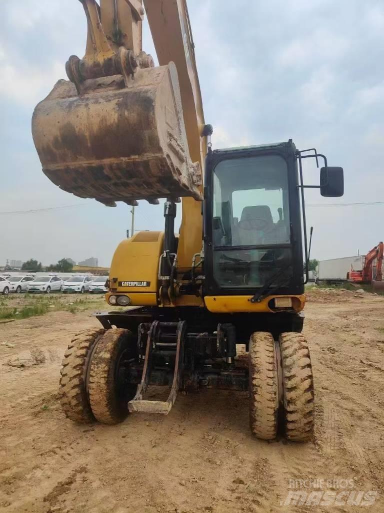 CAT M315D2 Bageri guseničari