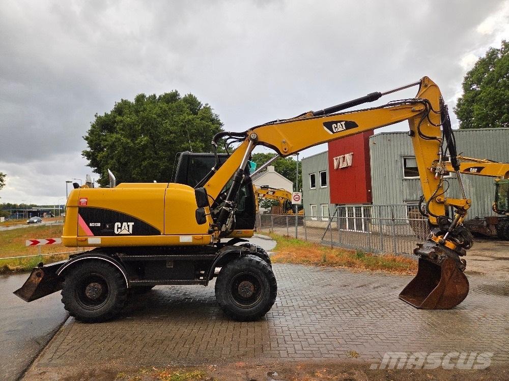 CAT M313D Bageri točkaši