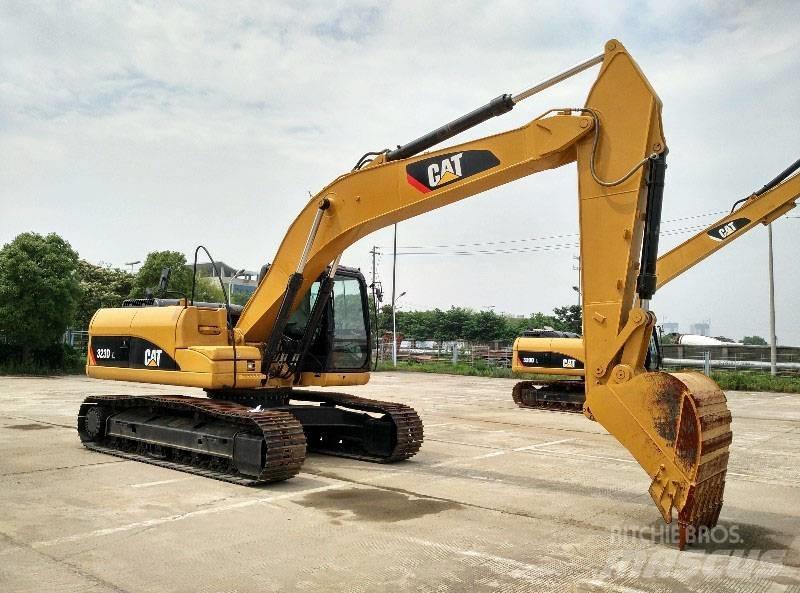 CAT 323 Bageri guseničari