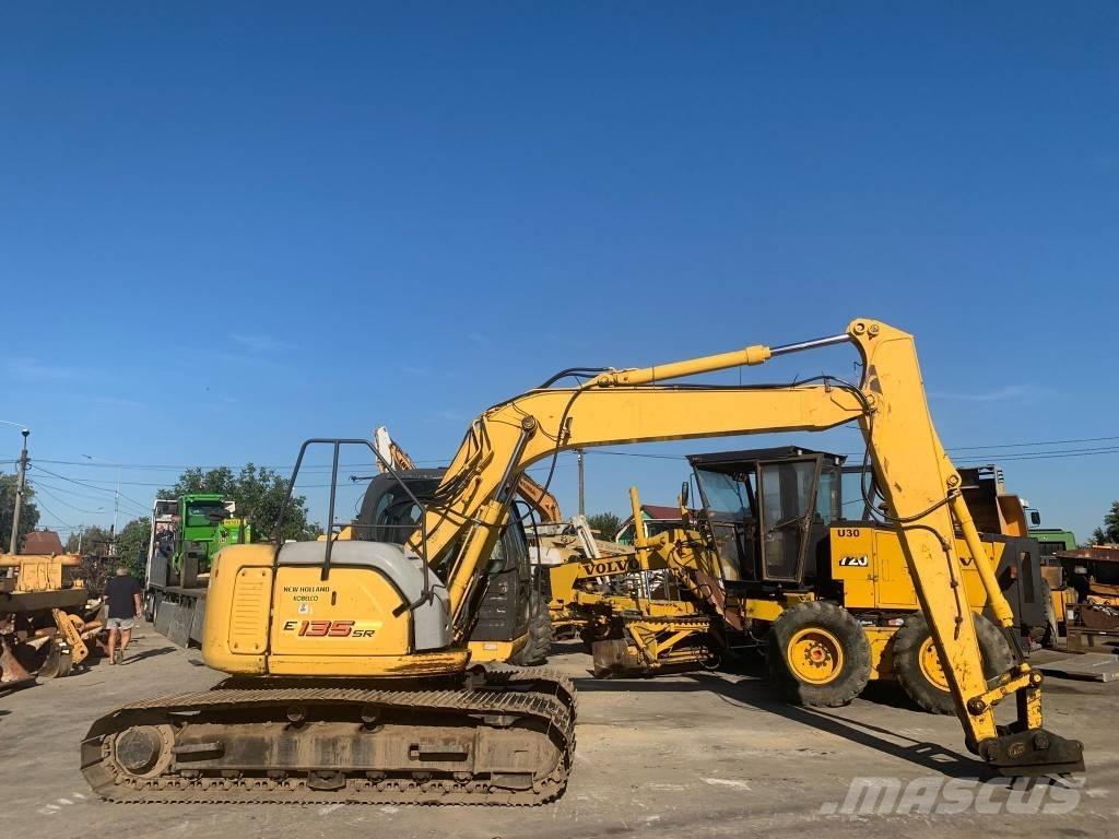 New Holland E 135 SR Bageri guseničari