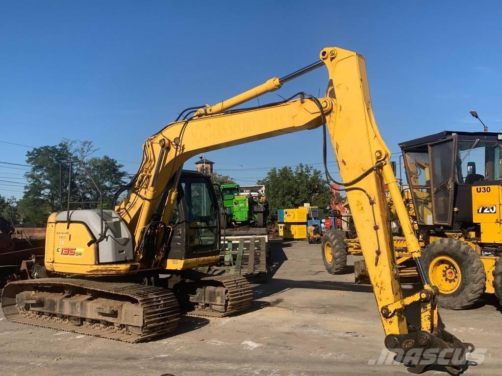 New Holland E 135 SR Bageri guseničari