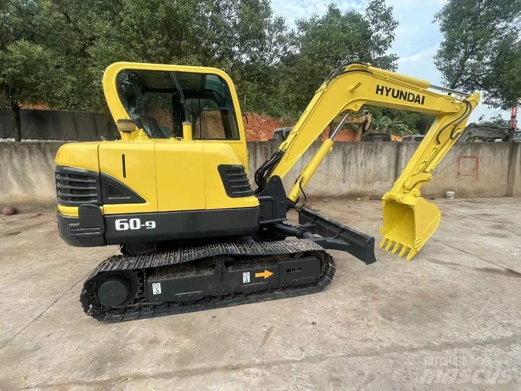 Hyundai R60-9 Bageri guseničari