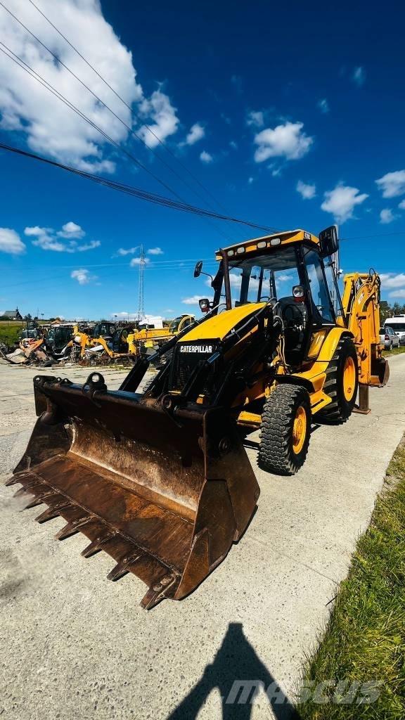 CAT 428 C Rovokopači