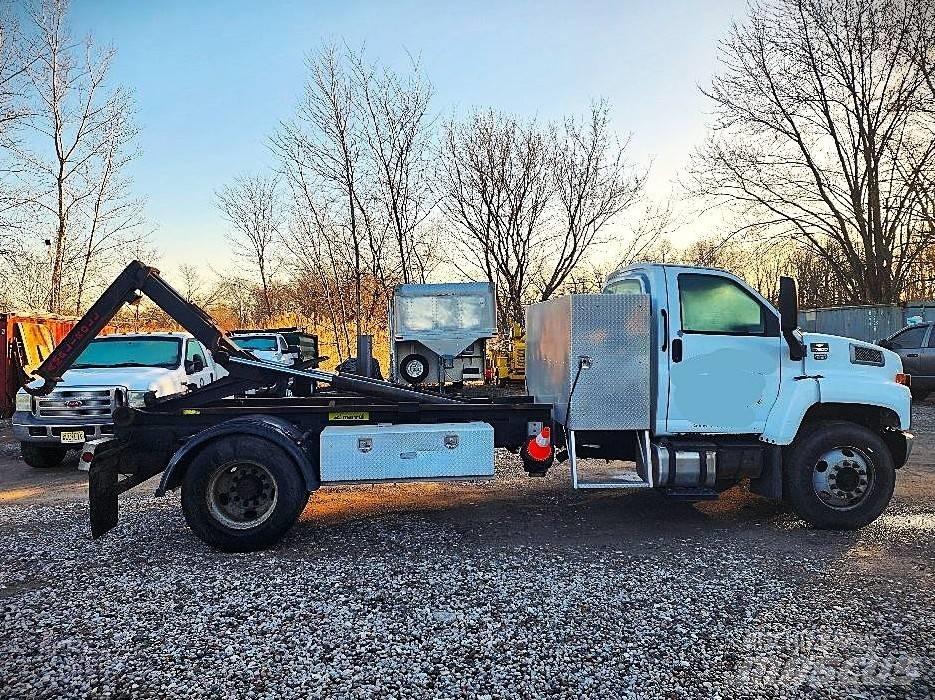 GMC 7500 Rol kiper kamioni sa kukom za podizanje tereta