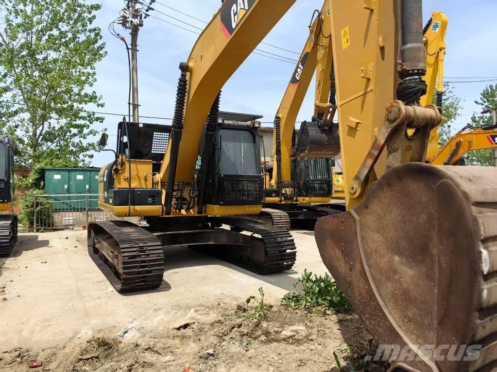 CAT 323 D Bageri guseničari