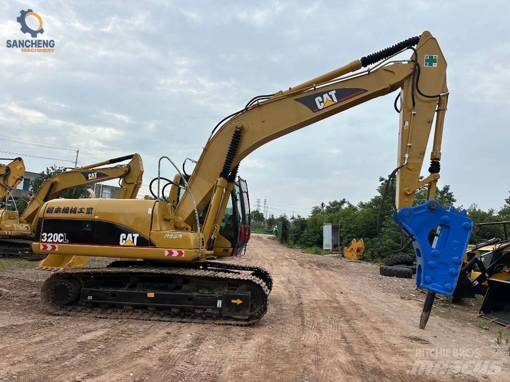 CAT 320 CL Bageri guseničari
