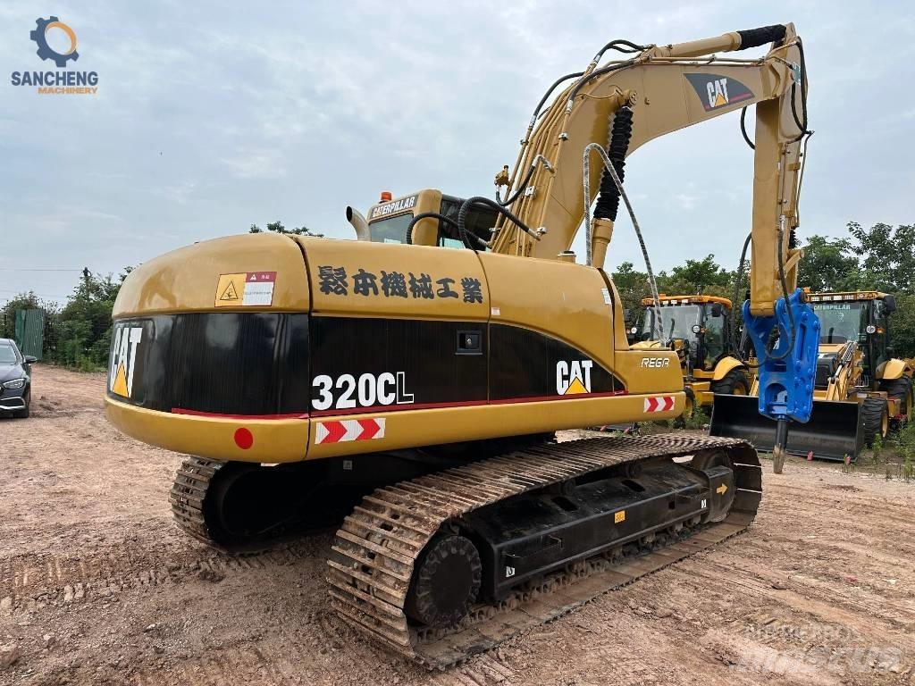 CAT 320 CL Bageri guseničari