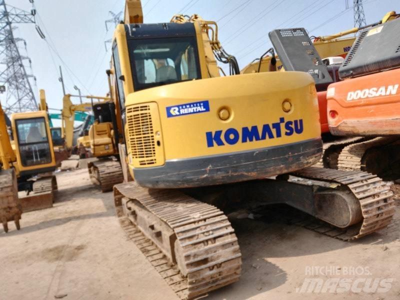 Komatsu PC 128 US-8 Midi bageri 7t – 12t