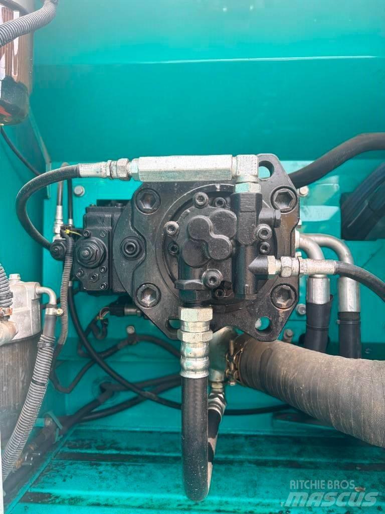 Kobelco SK 210 Bageri guseničari