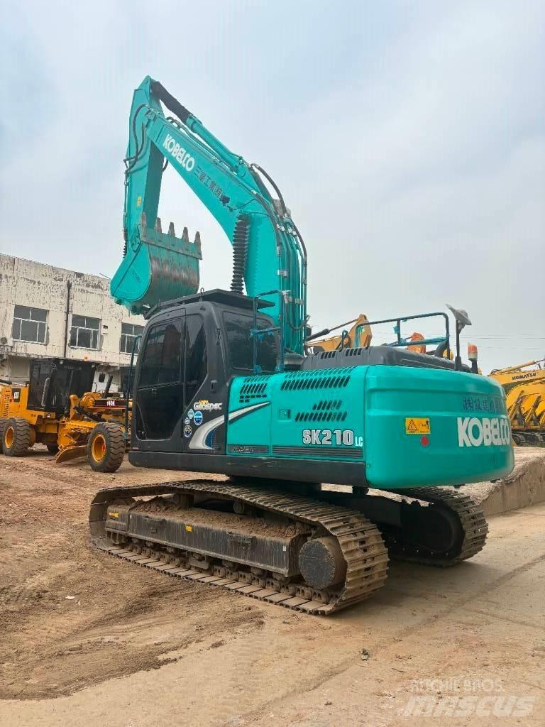 Kobelco SK 210 Bageri guseničari