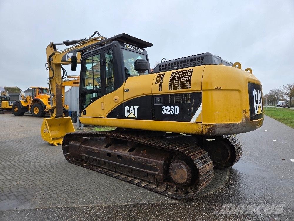 CAT 323DL Bageri guseničari