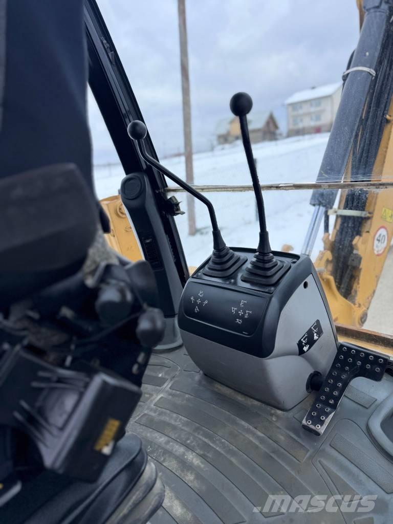 CAT 428 E Rovokopači