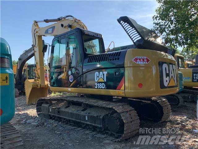 CAT 318DL Bageri guseničari
