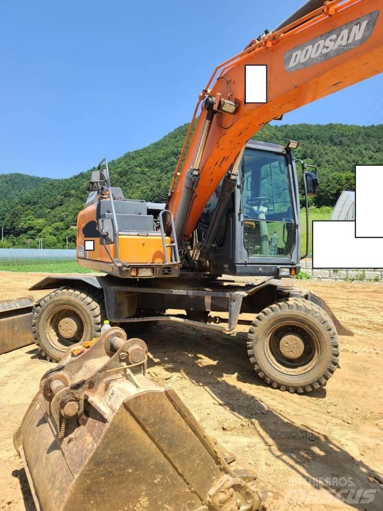 Doosan DX 140 W Bageri točkaši