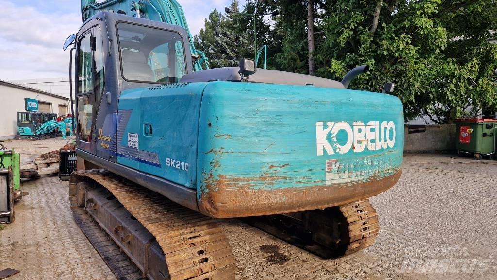 Kobelco SK210 Bageri guseničari