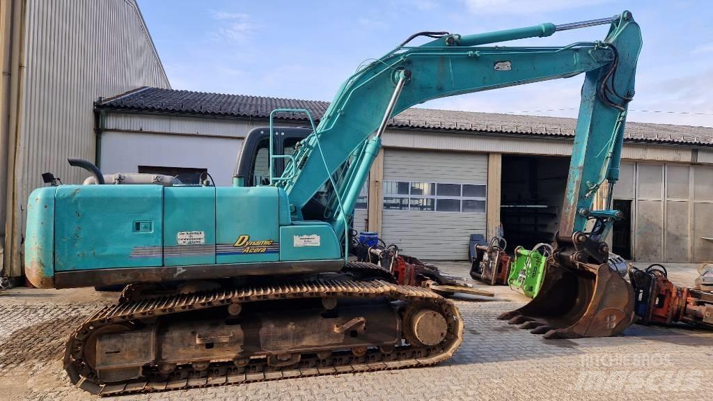 Kobelco SK210 Bageri guseničari