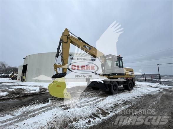 CAT M318D Bageri točkaši