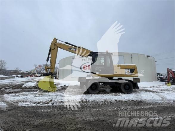 CAT M318D Bageri točkaši