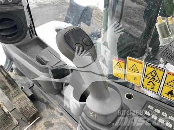 CAT M318D Bageri točkaši