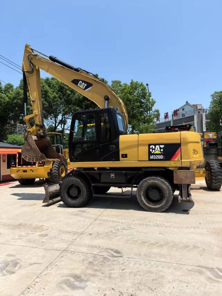 CAT M 320 Bageri točkaši