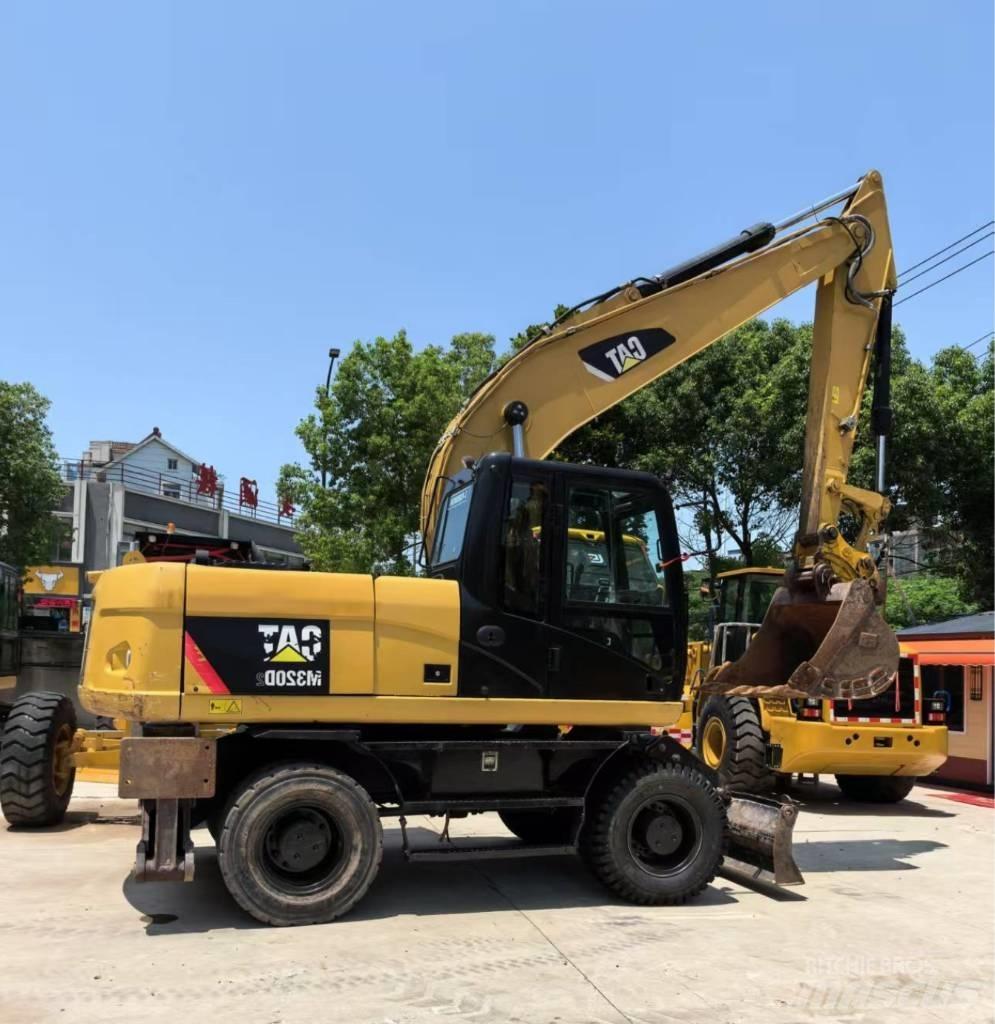 CAT M 320 Bageri točkaši