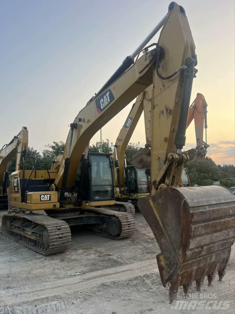 CAT 323 GC Bageri guseničari