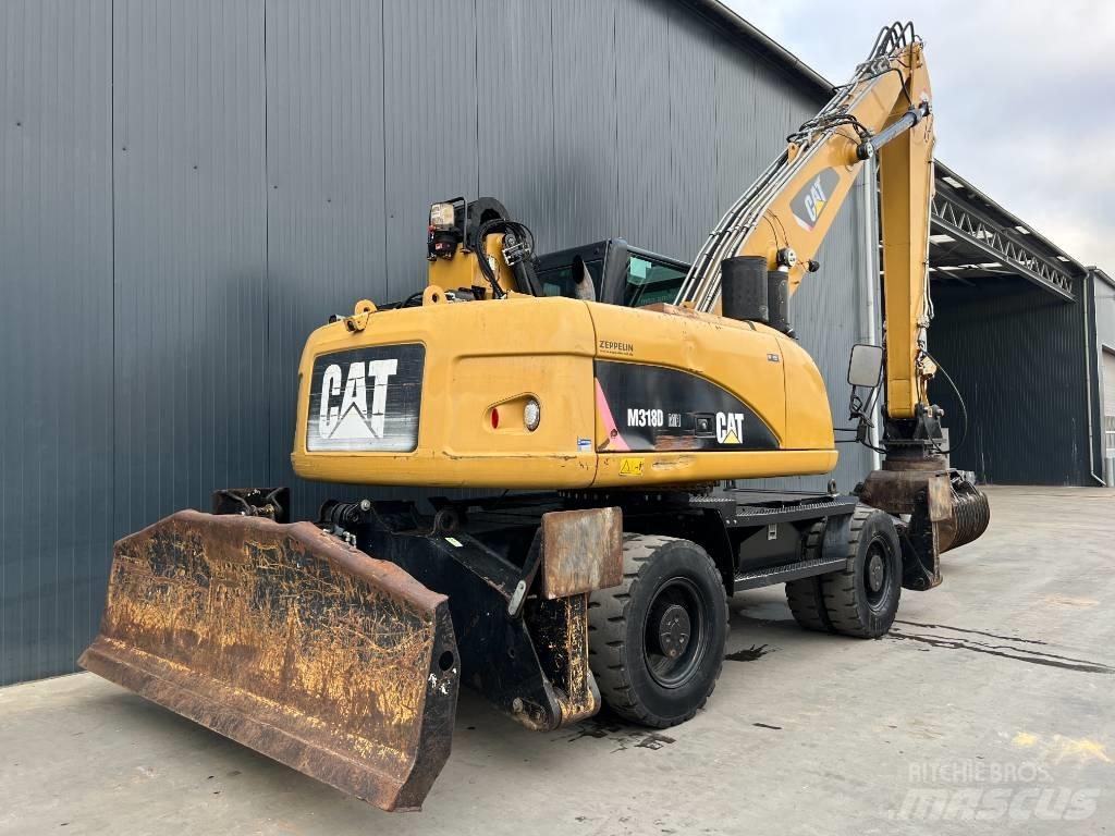 CAT M318D MH Bageri za prenos primarnih/sekundarnih sirovina