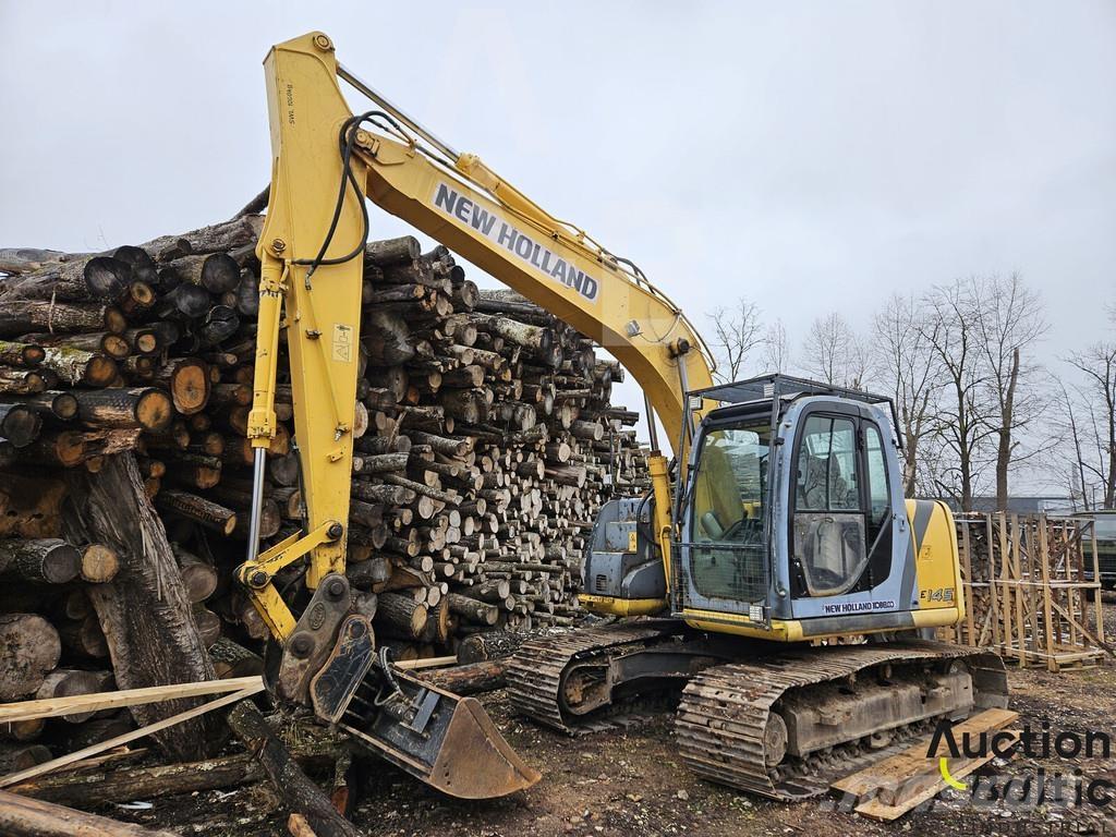 New Holland E 145 Bageri guseničari