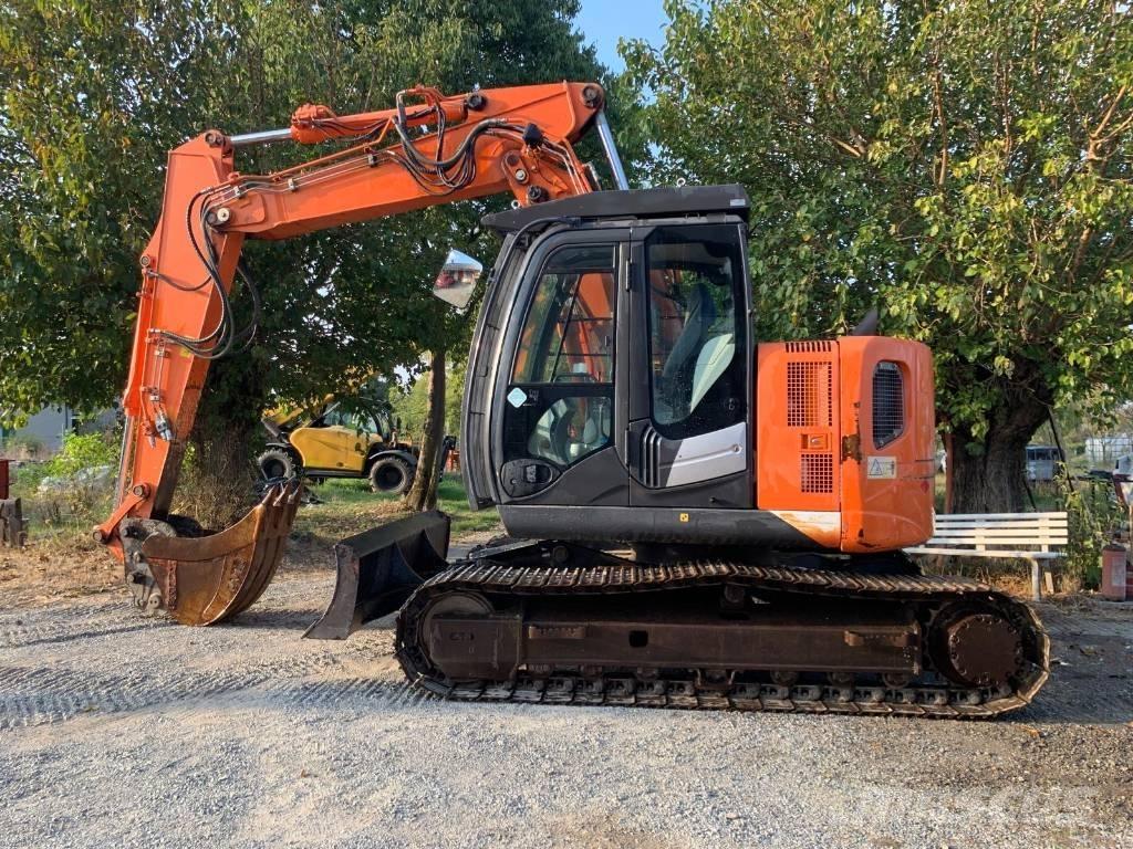 Hitachi ZX 135 US-5B Bageri guseničari