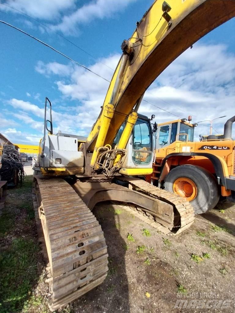 New Holland E 305 Bageri guseničari