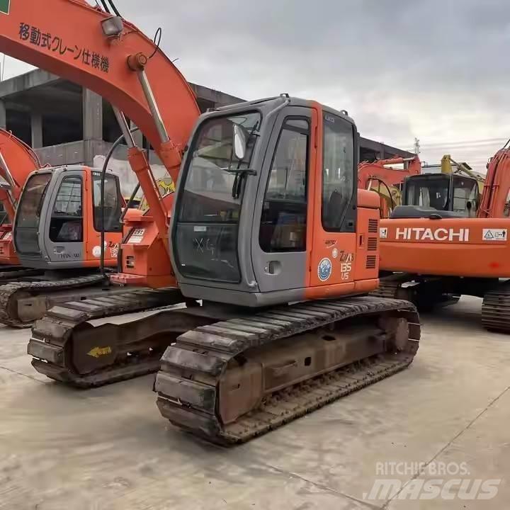 Hitachi ZX135US Bageri guseničari