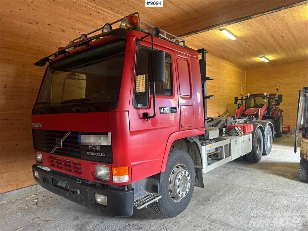Volvo FL12 Rol kiper kamioni sa kukom za podizanje tereta