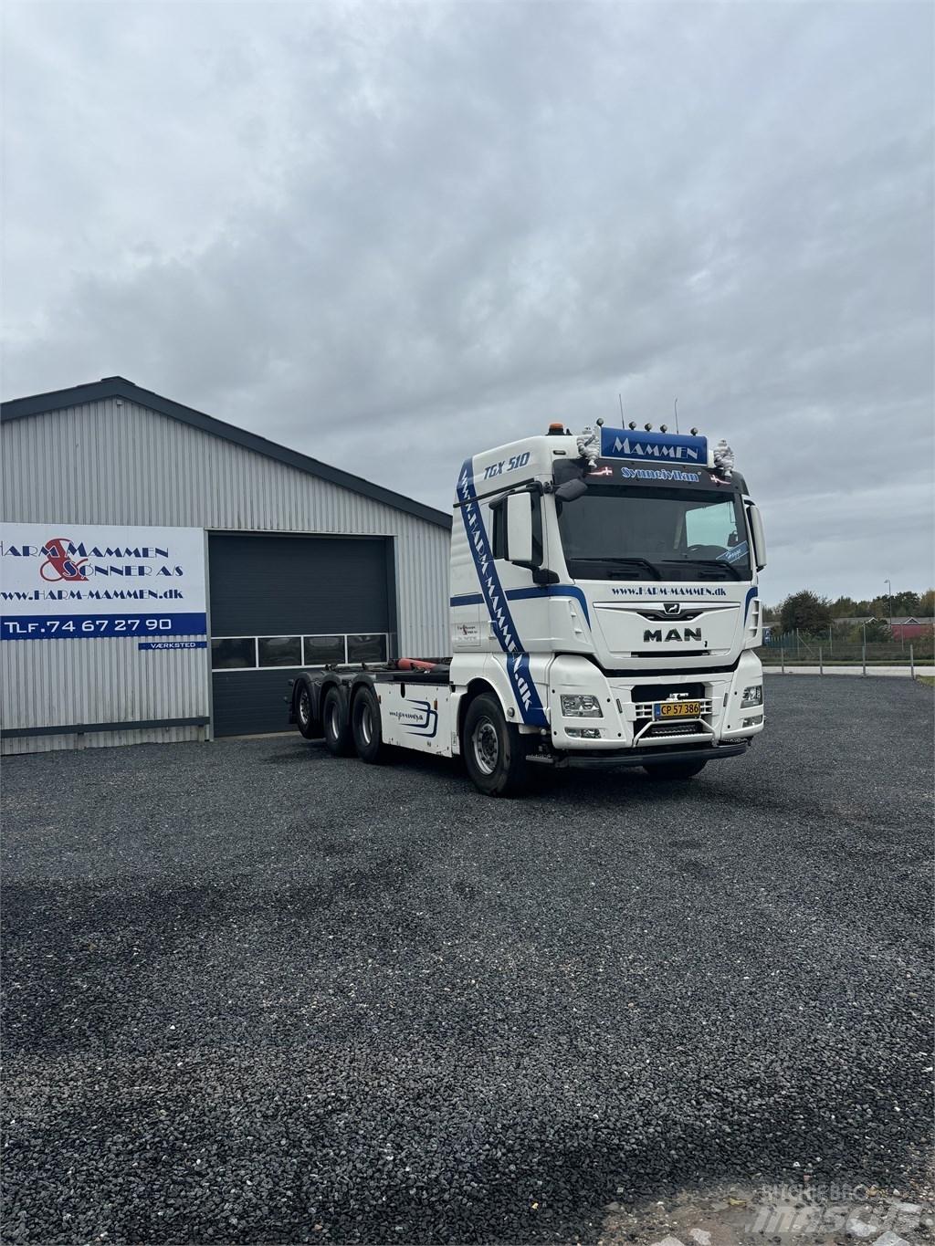 MAN TGX 35.510 Rol kiper kamioni sa kukom za podizanje tereta