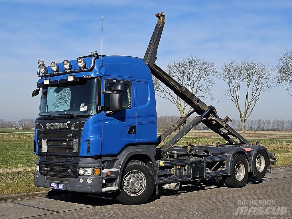 Scania R500 Rol kiper kamioni sa kukom za podizanje tereta