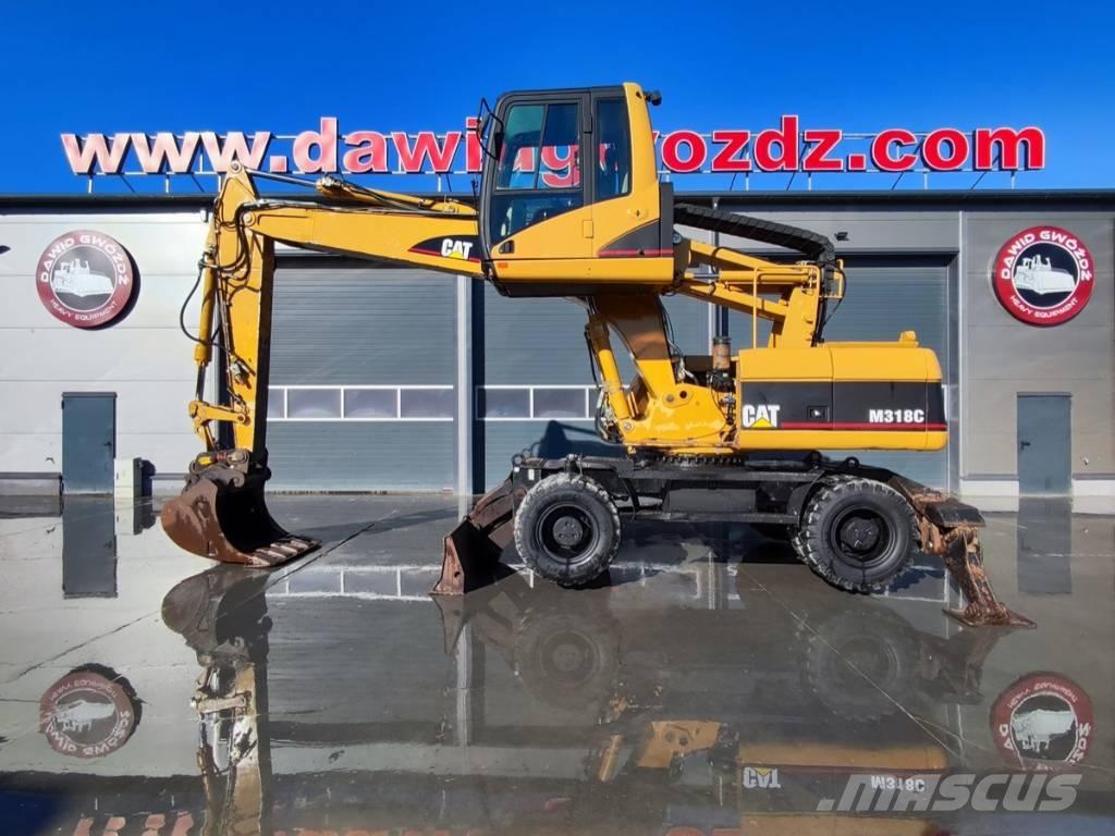 CAT M 318 C Bageri točkaši