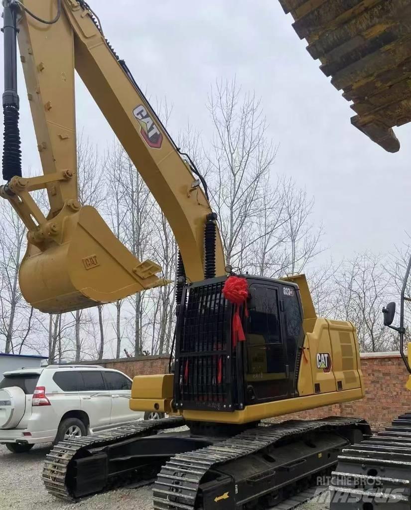 CAT 323 Bageri guseničari