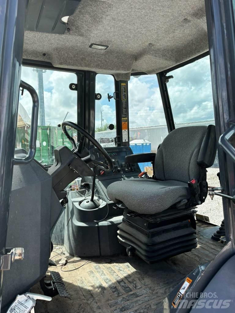 DEERE 310L EP Rovokopači