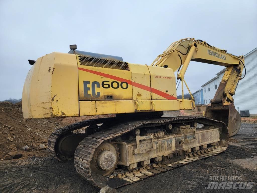 New Holland EC600 Bageri guseničari