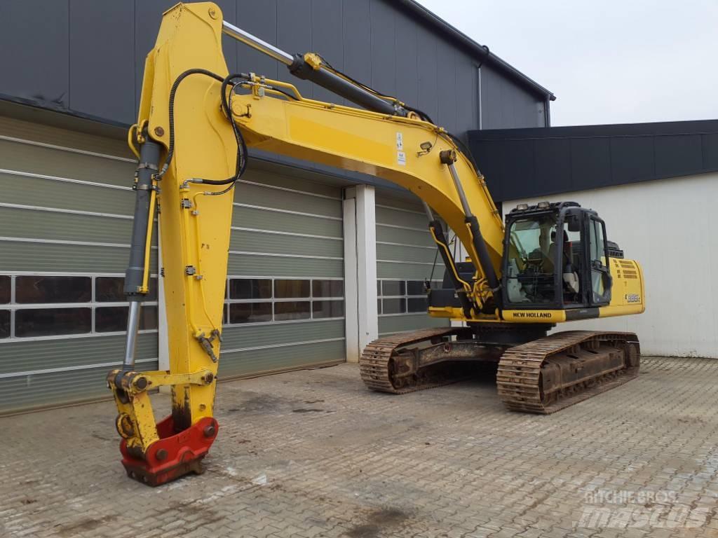 New Holland E 385 C Bageri guseničari