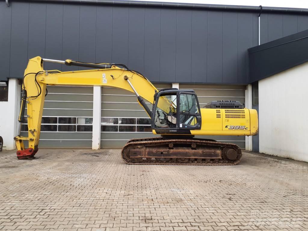 New Holland E 385 C Bageri guseničari